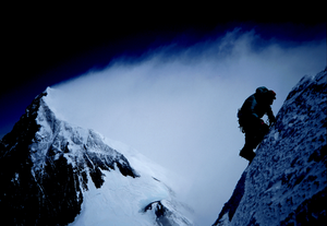 Ed Viesturs summits Lhotse with Everest in background
